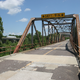 Note the semi crossing the Interstate 44 bridge in the background. Despite the presence of the modern interstate, this bridge still provides a link to people living on either side of the river.